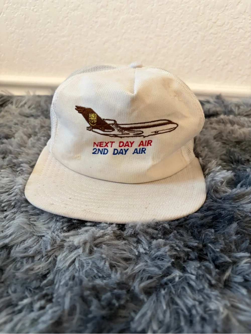 Vintage UPS Next Day Air Trucker Hat Mesh Snapback Cap White Airplane Corporate
